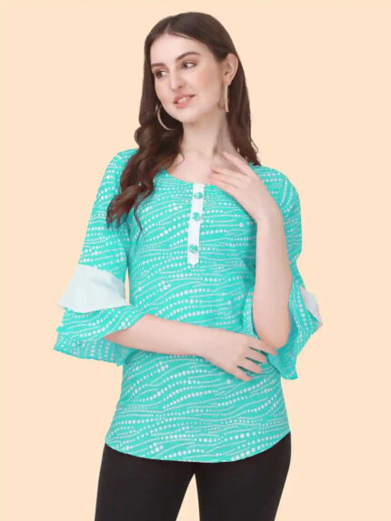 chic light green solid crepe top featuring white polka dots