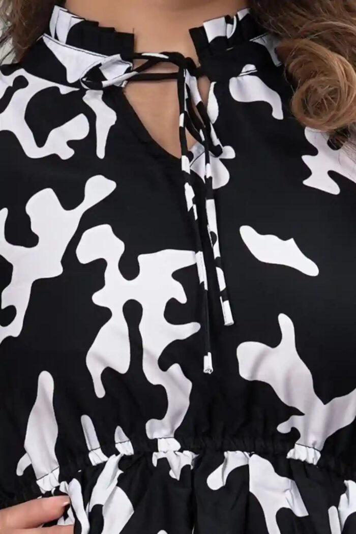 comfortable black floral tunic with ruffle neck for parties